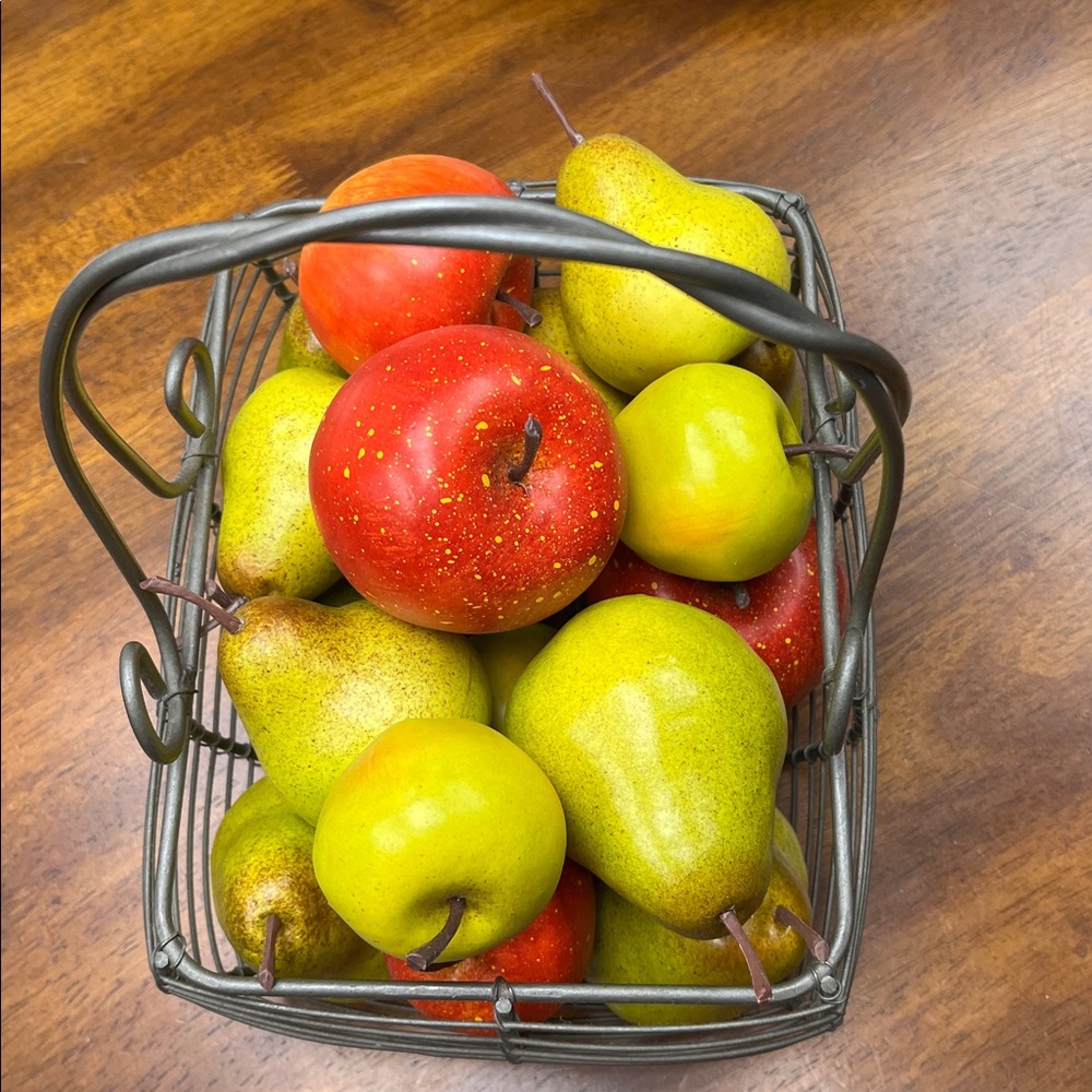 Lot of faux foam fruit. Pears and apples. Great for decorating. Various sizes.